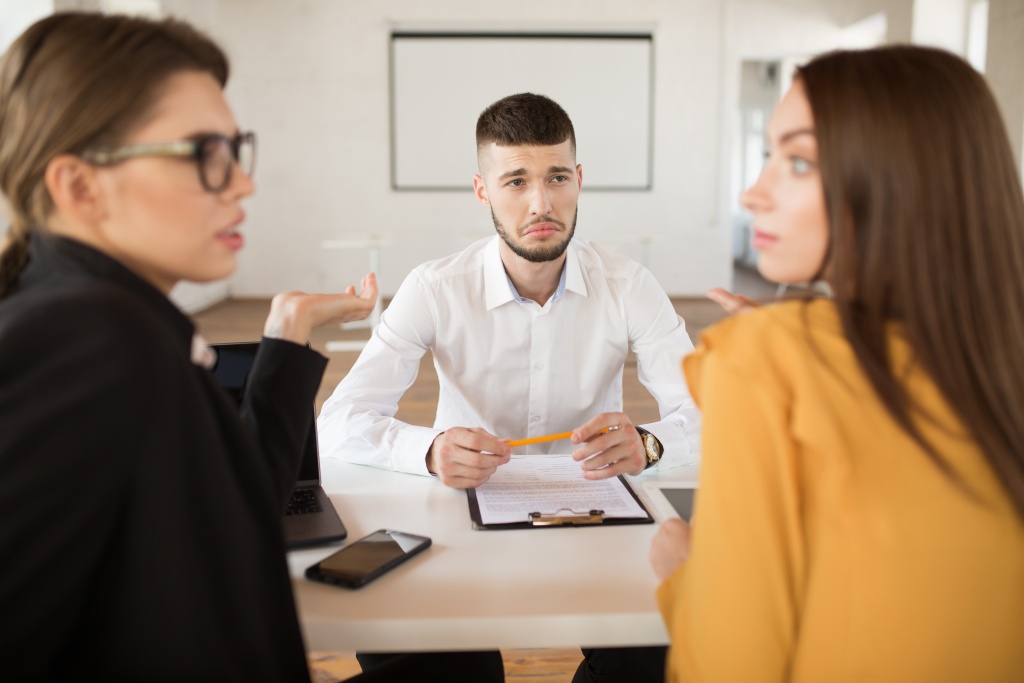 young-upset-man-white-shirt-sadly-looking-employers-while-spending-time-modern-office-male-applicant-waiting-results-job-interview.jpg телефон